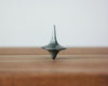 image of a spinning top
